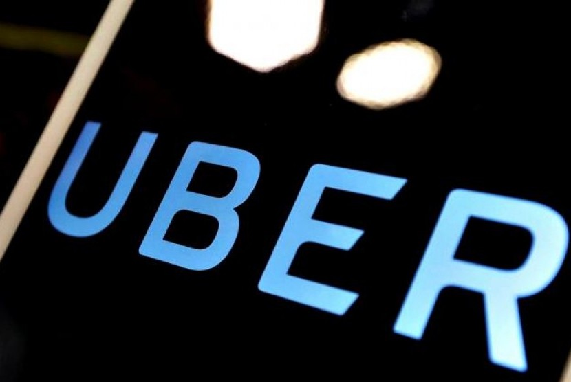 PHK Ribuan Karyawan dalam 2 Bulan, Ada Apa dengan Bisnis Raksasa Uber?. (FOTO: Reuters/Tyrone Siu)