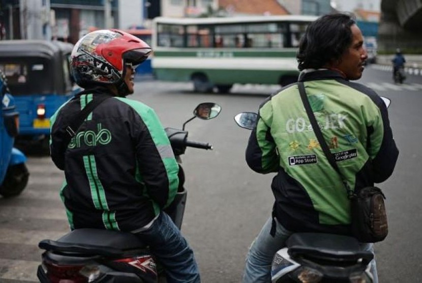 Demo Driver Ojol, Grab PHK Sepihak Saja?. (FOTO: Dimas Ardian/Bloomberg)