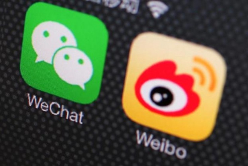 Lawan Dominasi Alipay, WeChat Pay Minta Bantuan Visa hingga MasterCard. (FOTO: REUTERS/Petar Kujundzic)