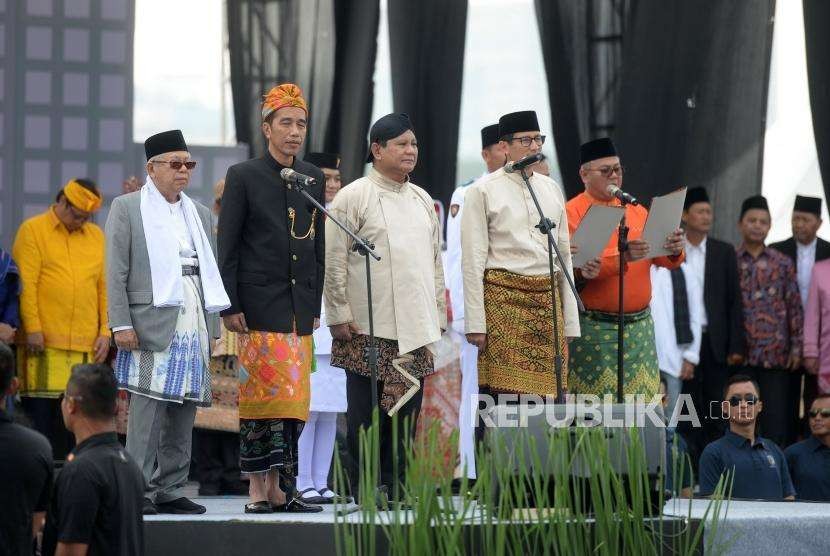 Pasangan Capres nomer 01 Joko Widodo-Maruf Amin (kiri) dan Pasangan Capres no 02 Prabowo Subianto-Sandiaga Uno (kanan).