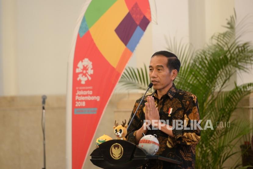 President Joko Widodo delivers his speech in a meeting to promote Asian Games at the State Palace here on Tuesday.