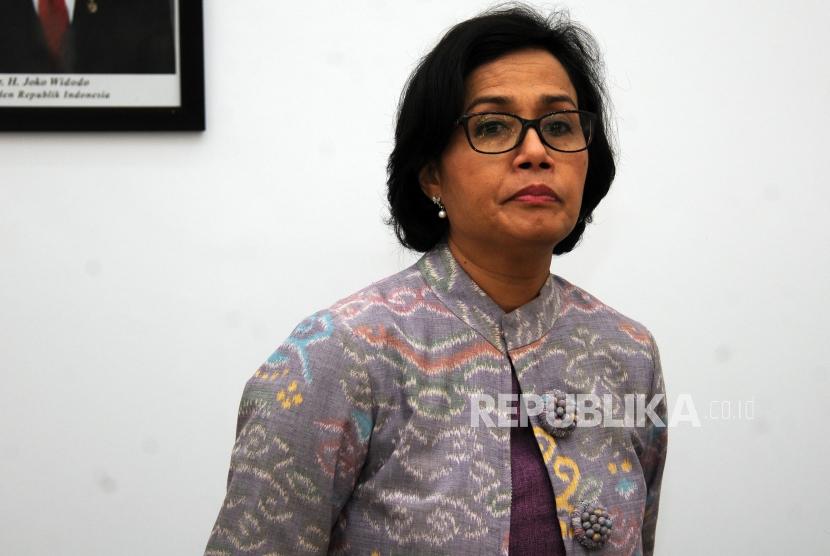 Menteri Keuangan Sri Mulyani usai penandatanganan Surat Keputusan Bersama (SKB) di Kementerian Koordinator Bidang Pembangunan Manusia dan kebudayaan, Jakarta, Senin (18/12).