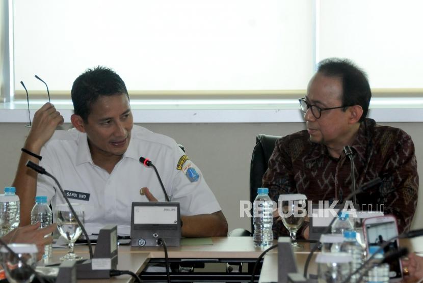 Menteri Pariwisata dan Ekonomi Kreatif Sandiaga Uno (kiri) bersama Ketua Umum PPHI Riyanto Sofyan. Perkumpulan Pariwisata Halal Indonesia (PPHI) mendukung rencana Menteri Pariwisata dan Ekonomi Kreatif Sandiaga Uno memajukan pariwisata halal. 
