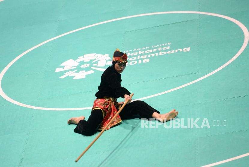 Pesilat Indonesia Puspa Arum Sari diharapkan menyumbang emas pada cabang pencak silat SEA Games 2019, Selasa (3/12).