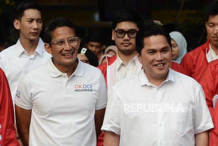   Ketua Tim Kampanye Nasional Jokowi-Ma'ruf, Erick Thohir bertemu dengan Sandiaga Uno yang merupakan mantan Cawapres RI pendamping Prabowo Subianto pada acara Young Penting Indonesia di Kemang, Jakarta Selatan, Sabtu (13/7).