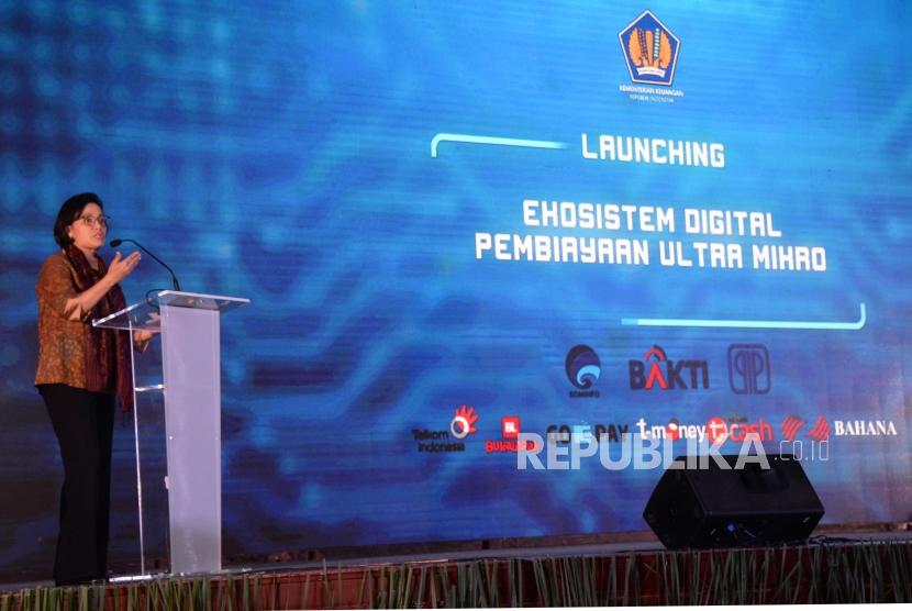 Menkeu Sri Mulyani Indrawati memberikan sambutan pada Launching Ekosistem Digital Pembiayaan Ultra Mikro (UMi) di Kantor Kementerian Keungaan, Jakarta, Selasa (11/12).