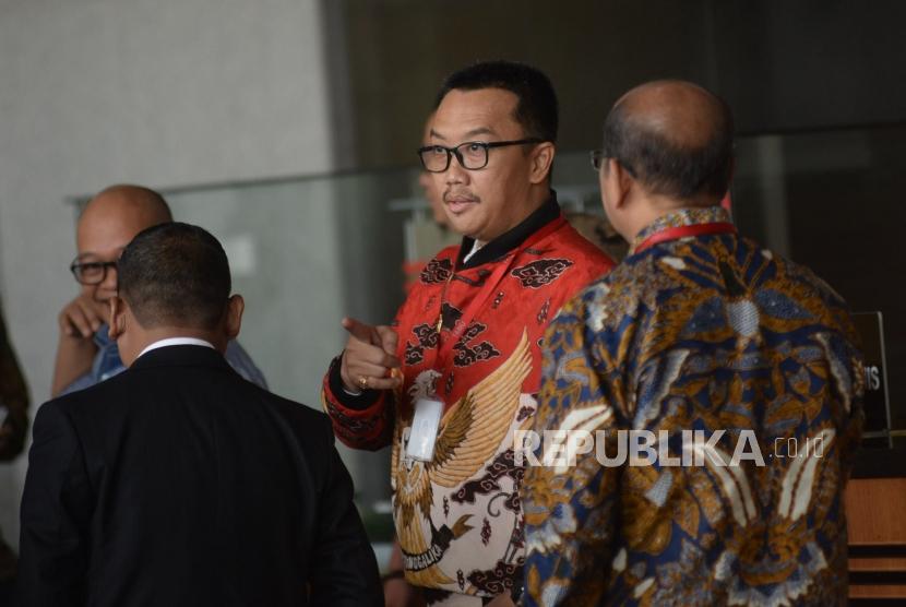 Mantan Menteri Pemuda dan Olahraga Imam Nahrawi bersiap menjalani pemeriksaan di Gedung KPK Jakarta, Jumat, (27/9).