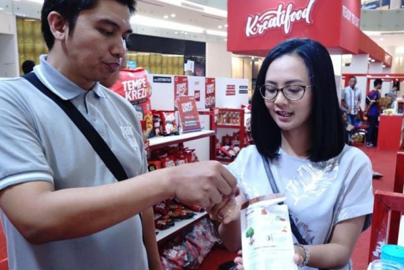 TomaTomi Tarik Perhatian Pengunjung Food Startup Indonesia, Siapa Dia?. (FOTO: Bekraf)