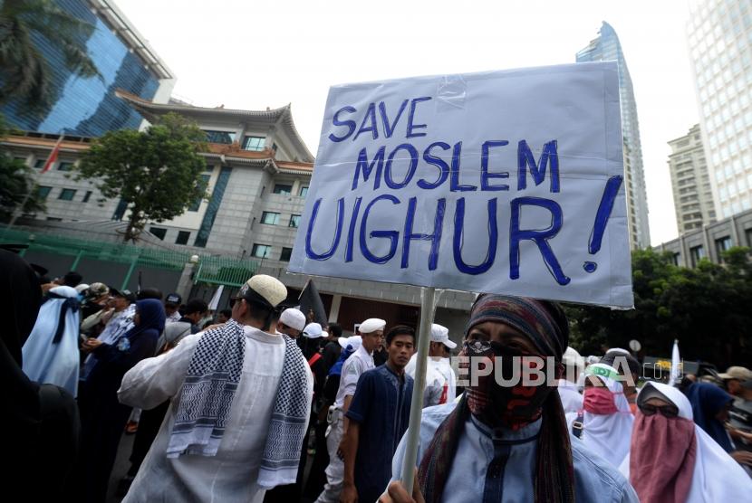 Thousands of people hold solidarity rally to support Uighurs Muslims in front of the Embassy of the People's Republic of China (PRC) on Mega Kuningan street, South Jakarta, on Friday (Dec 21).