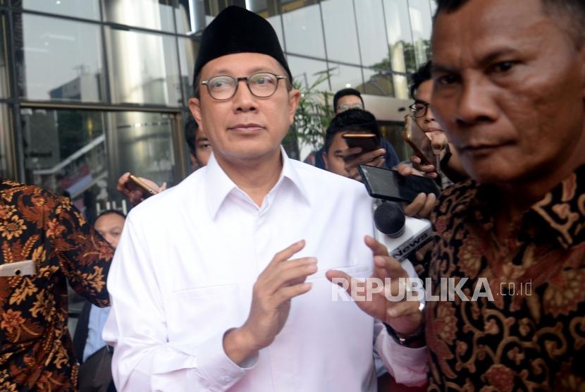 Menteri Agama Lukman Hakim Saifuddin usai menjalani pemeriksaan di kantor KPK, Jakarta, Rabu (8/5).