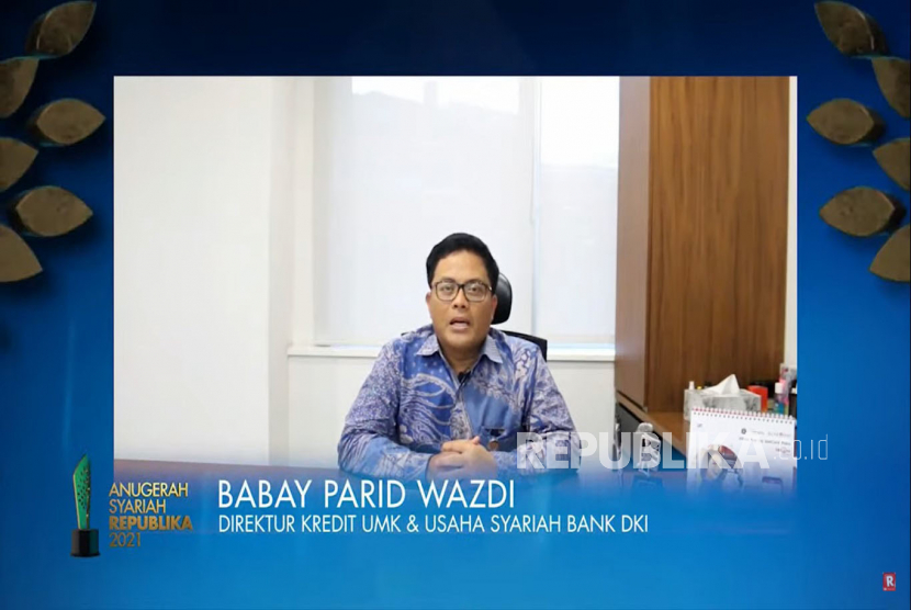 Direktur Kredit UMK & Usaha Syariah Bank DKI Babay Parid Wazdi memberikan sambutan dalam acara Anugerah Syariah Republika (ASR) 2021 yang diselenggarakan secara daring di Jakarta, Rabu (8/12).Prayogi/Republika.