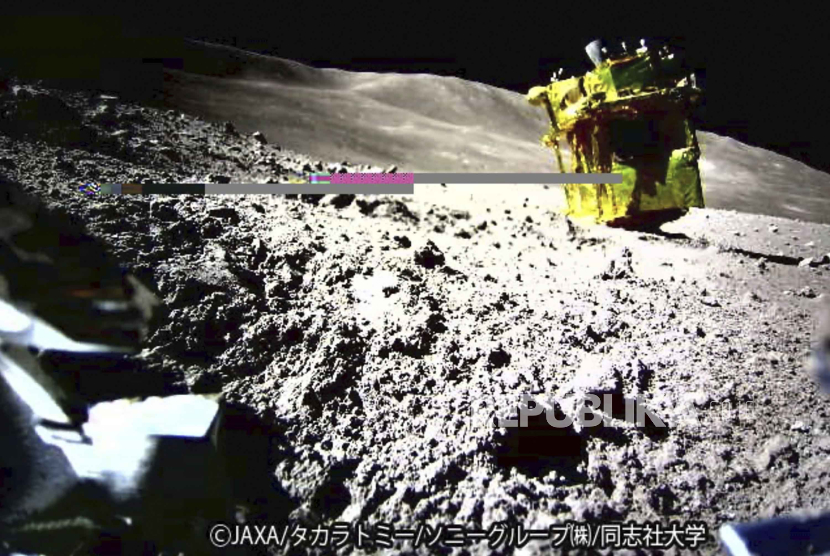 This image provided by the Japan Aerospace Exploration Agency (JAXA)/Takara Tomy/Sony Group Corporation/Doshisha University shows an image taken by a Lunar Excursion Vehicle 2 (LEV-2) of a robotic moon rover called Smart Lander for Investigating Moon, or SLIM, on the moon