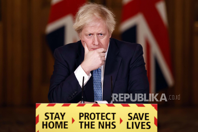  Perdana Menteri Inggris Boris Johnson berbicara selama briefing media tentang virus corona, COVID-19, di Downing Street, London, Kamis 7 Januari 2021.