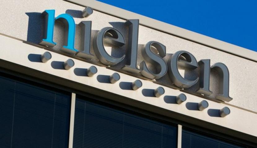 Nielsen Company. (AP Photo/Kris Tripplaar)