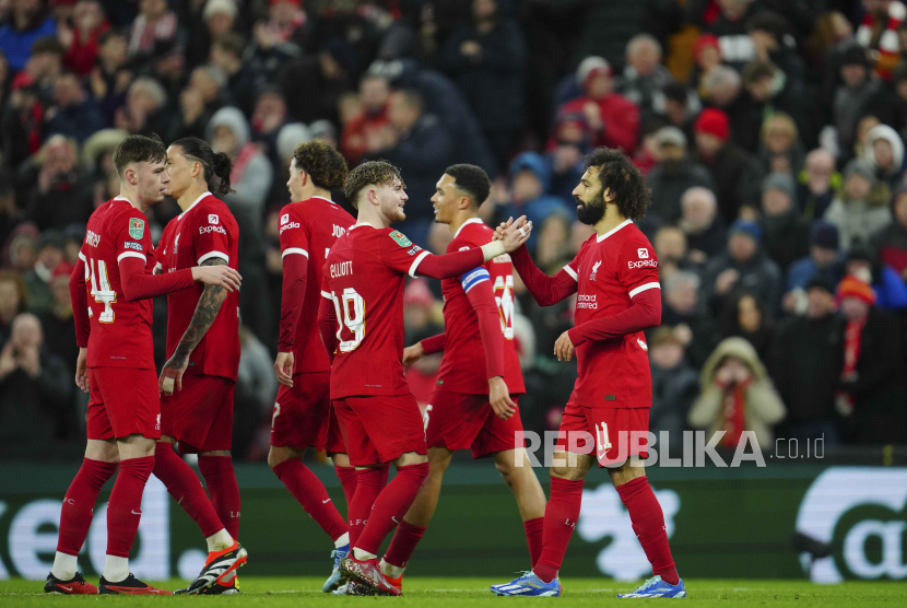 Para pemain Liverpool merayakan gol ke gawang West Ham United dalam ajang Piala Carabao.