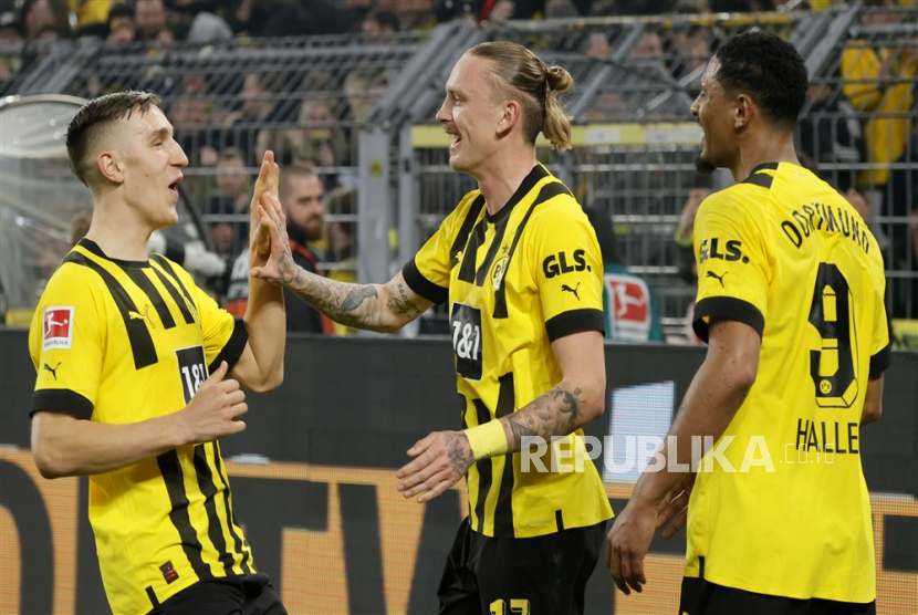 Para pemain Borussia Dortmund (ilustrasi). Dortmund di ambang merayakan gelar juara jika mengalahkan FSV Mainz pada laga pekan terakhir Bundesliga musim 2022/2023.