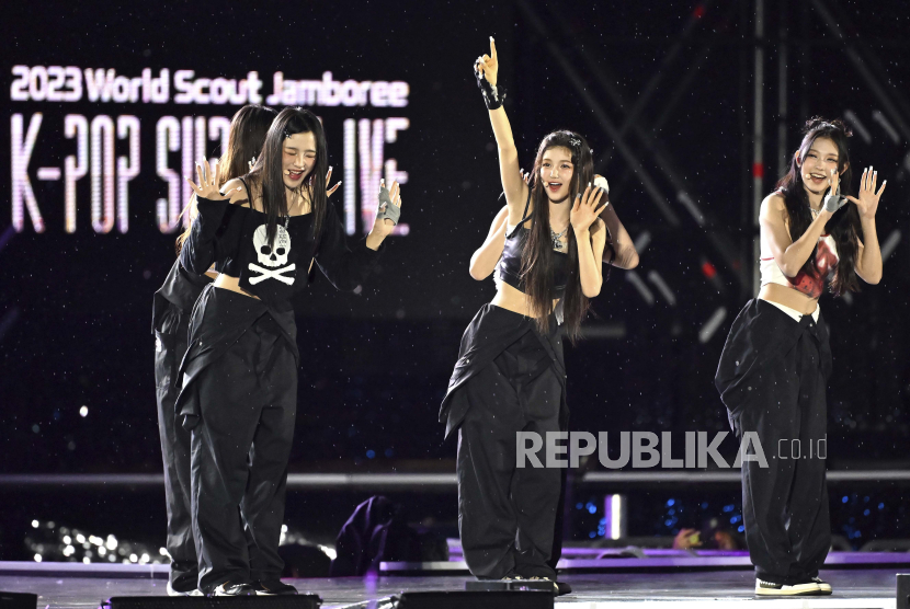 K-pop group NewJeans performs during a K-Pop concert after the closing ceremony of the World Scout Jamboree at the World Cup Stadium in Seoul, South Korea, Friday, Aug. 11, 2023. Flights and trains resumed and power was mostly restored Friday after a tropical storm blew through South Korea, which was preparing a pop concert for 40,000 Scouts whose global Jamboree was disrupted by the weather.