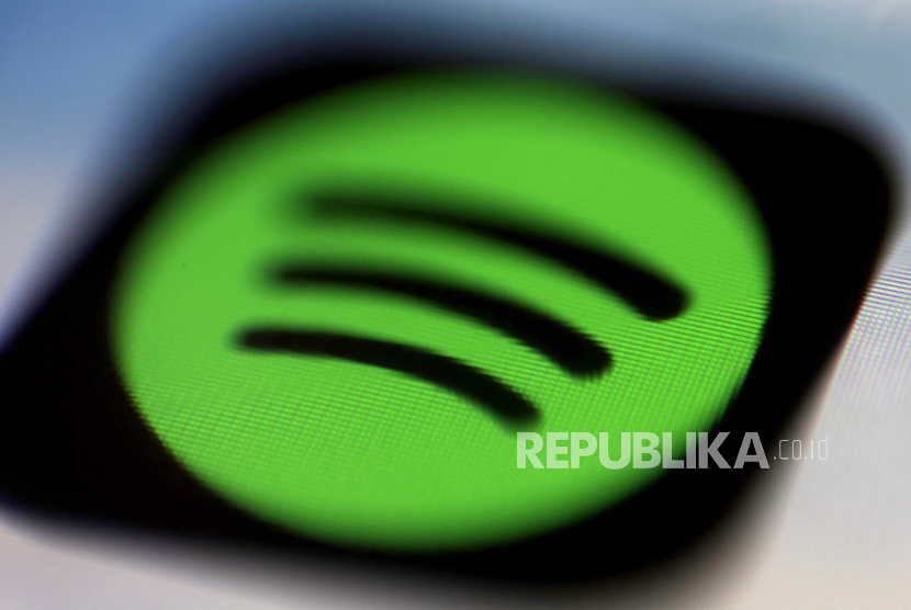  Ilustrasi foto menunjukkan ikon aplikasi raksasa streaming audio Swedia Spotify. Spotify menawarkan beberapa fitur baru untuk Wrapped tahun ini. 