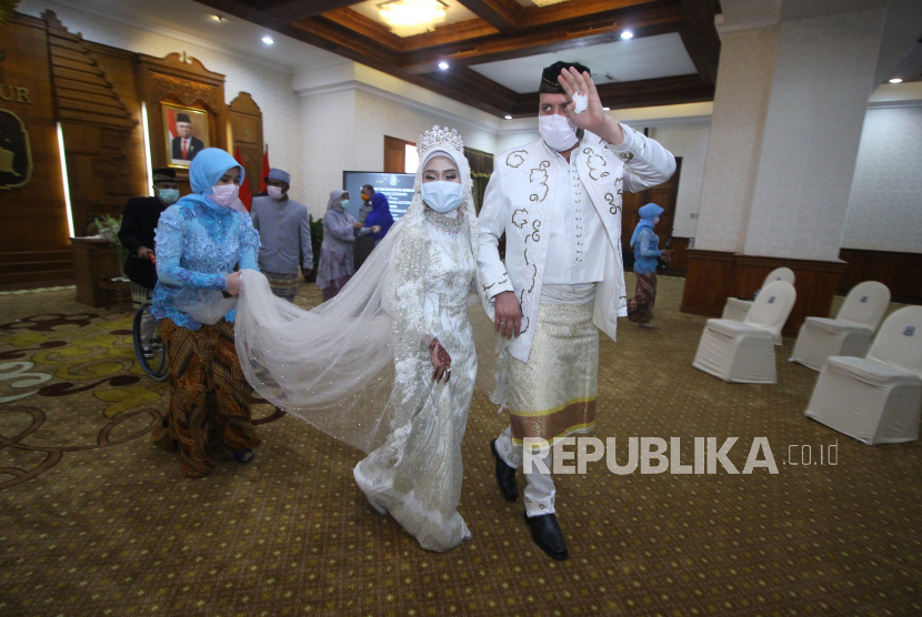 Resepsi pernikahan. Kegiatan kemasyarakatan diizinkan di Lumajang dengan menerapkan protokol kesehatan. Ilustrasi.