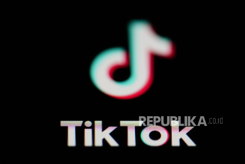 The icon for the video sharing TikTok app is seen on a smartphone, on Feb. 28, 2023. European regulators slapped TikTok with a $368 million fine on Friday, Sept. 15, 2023, for failing to protect children