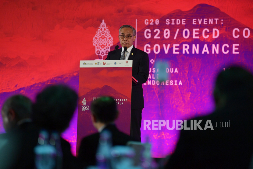 Ketua Otoritas Jasa Keuangan (OJK) Wimboh Santoso menyampaikan sambutan dalam G20/OECD Corporate Governance Forum di sela 3rd FMCBG-FCBD G20 di Nusa Dua, Bali, Kamis (14/7/2022). Forum tersebut membahas berbagai hal tentang tata kelola perusahaan. 