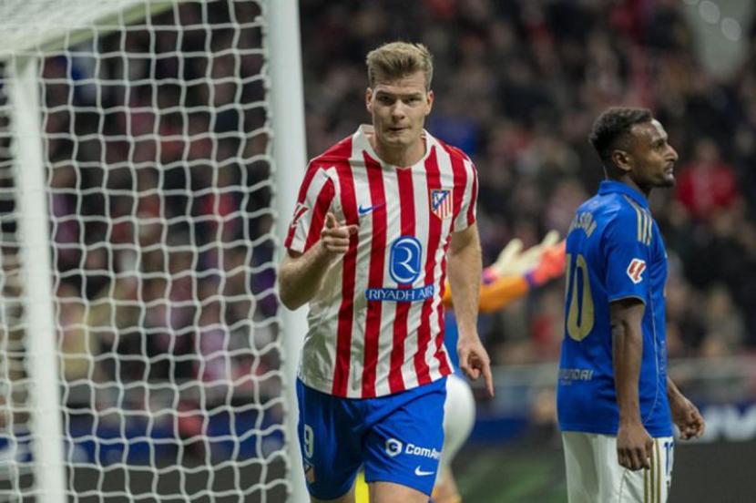 Atletico raih tujuh kemenangan beruntun setelah kalahkan Oviedo 2-0.