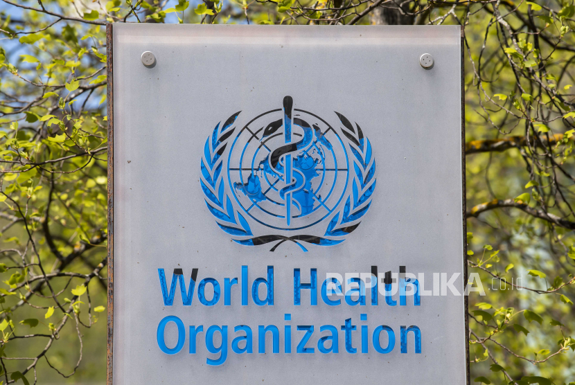 Logo dan gedung kantor pusat Organisasi Kesehatan Dunia (WHO).