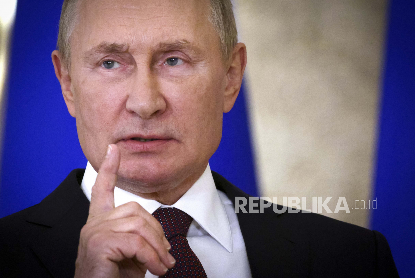  Presiden Rusia Vladimir Putin. Perundingan Kiev dan Moskow hanya bakal dijalin jika Rusia memiliki presiden baru. Ilustrasi.