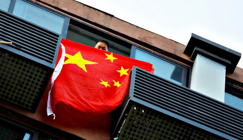 Uji Coba Yuan Digital, Pemerintah China Luncurkan Lotere Yuan Digital (Foto: Reuters/Thomas Peter)
