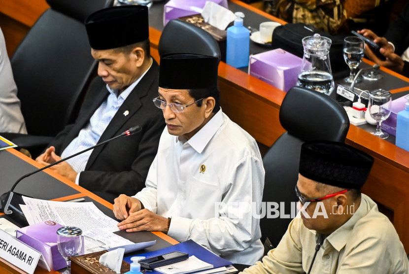 Menteri Agama Nasaruddin Umar (tengah).