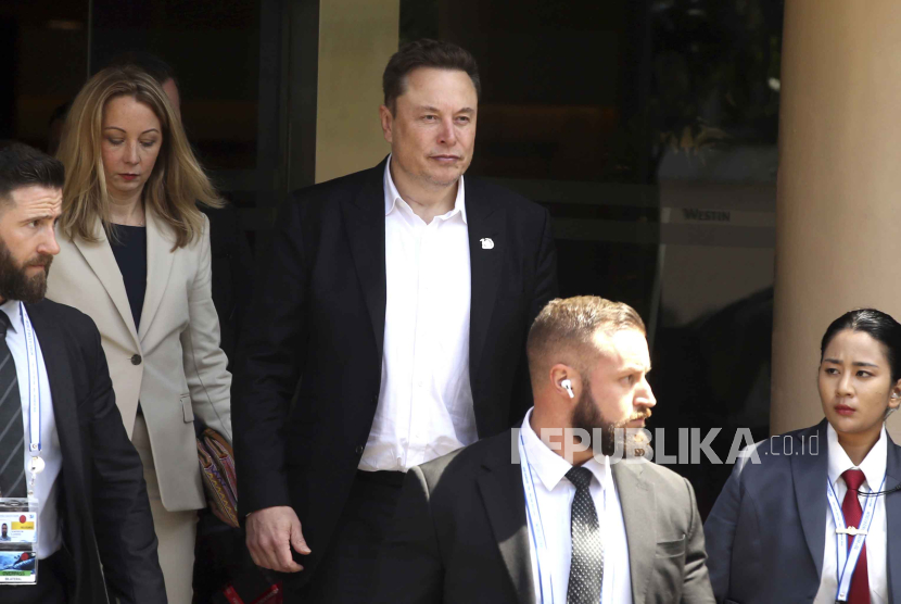 Elon Musk, center, arrives for the 10th World Water Forum in Nusa Dua, Bali, Indonesia on Monday, May 20, 2024.  