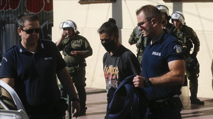 Lebih dari 100 orang telah ditahan di ibu kota Yunani pada Ahad (6/12).