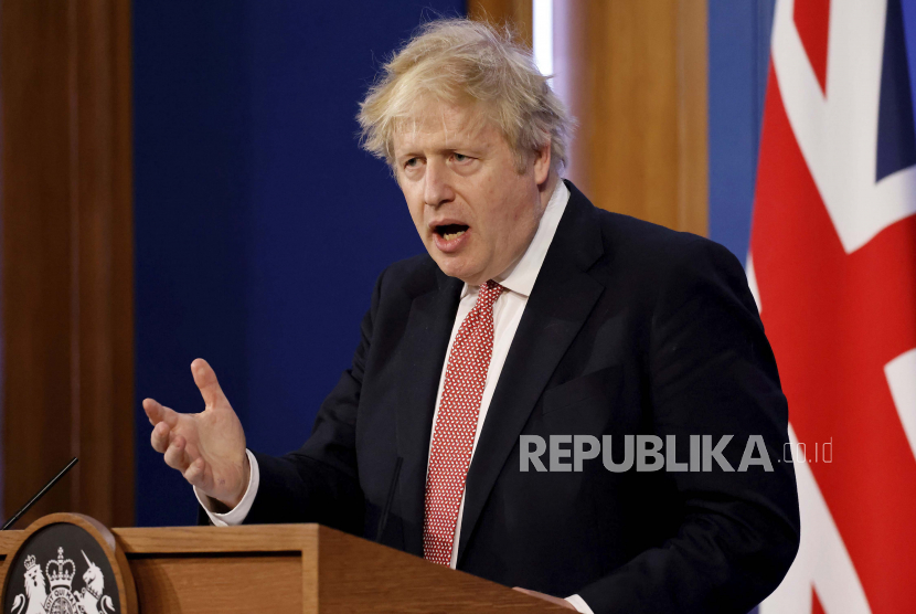 Perdana Menteri Inggris Boris Johnson berbicara dalam konferensi pers di Downing Street, London, Senin 21 Februari 2022, untuk menguraikan rencana jangka panjang baru Pemerintah terhadap COVID-19.
