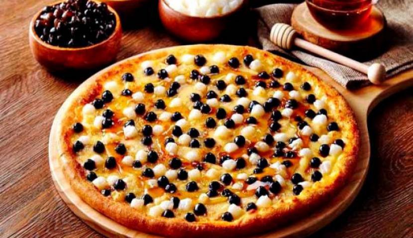 Curhat Bos Domino Pizza Selama Pandemi Corona: Segalanya Akan Berbeda. (FOTO: Sindonews)