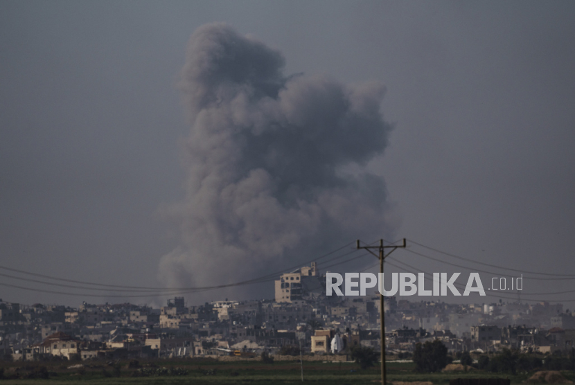 Smoke rises following an Israeli bombardment in the Gaza Strip, as seen from southern Israel, Monday, Jan. 8, 2024.