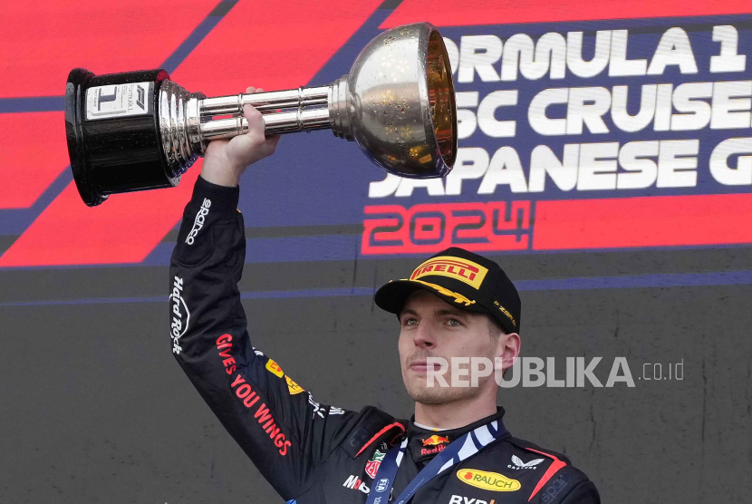 Red Bull driver Max Verstappen of the Netherlands celebrates his win during the Japanese Formula One Grand Prix at the Suzuka Circuit in Suzuka, central Japan, Sunday, April 7, 2024.  