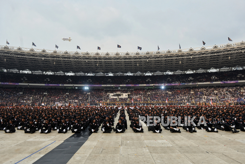 Kader Partai Nasdem saat mengikuti acara Apel Siaga Perubahan Partai Nasdem di Stadion Utama Gelora Bung Karno. Politikus Nasdem sebut usung Anies tapi tetap dalam pemerintahan Jokowi hal berbeda.