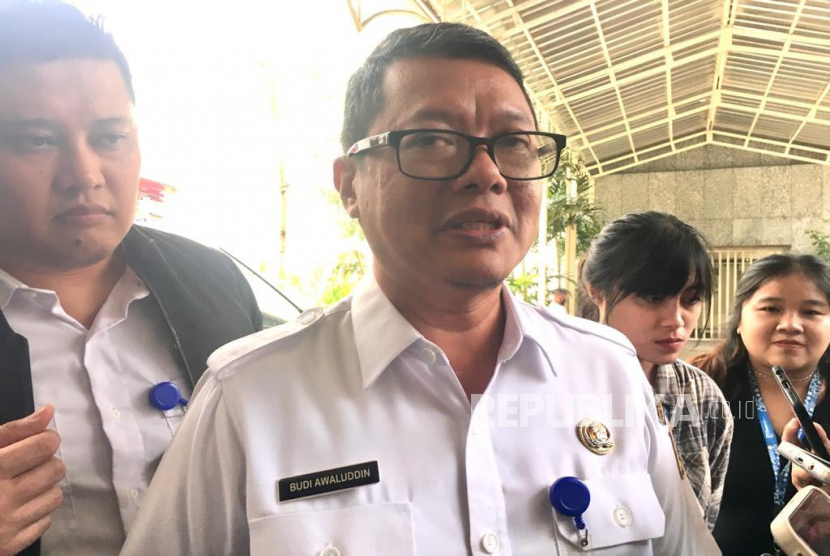 Kepala Dinas Kependudukan dan Pencatatan Sipil (Disdukcapil) DKI, Budi Awaluddin saat memberikan keterangan di Balai Kota, Jakarta Pusat pada Rabu (26/4/2023).