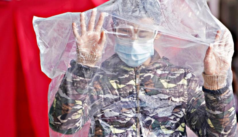 Gak Punya Hati! Pengusaha China Jual Masker Palsu di Tengah Pandemi, Nasibnya Kini di Jeruji Besi!. (FOTO: Reuters/Aly Song)