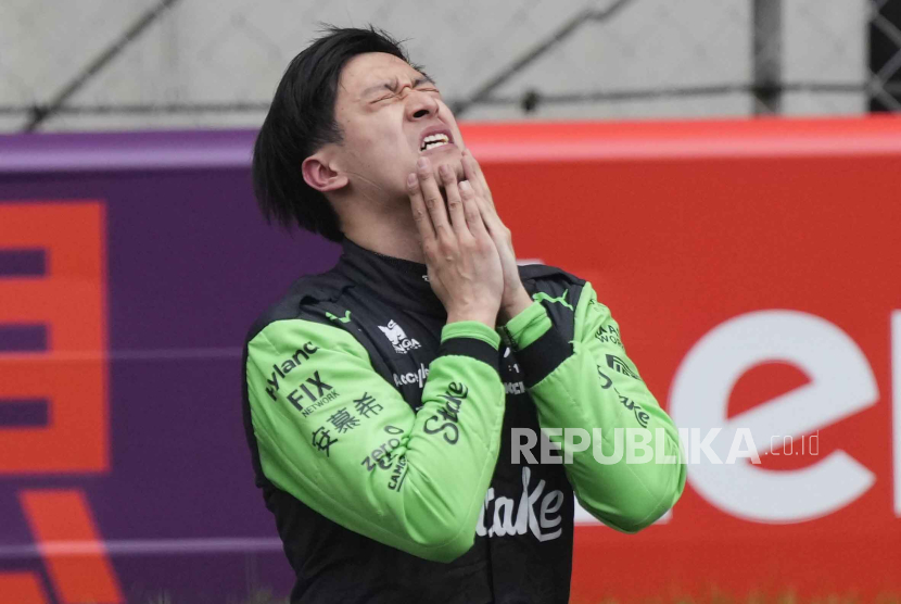 Sauber driver Zhou Guanyu of China reacts after the Chinese Formula One Grand Prix at the Shanghai International Circuit, Shanghai, China, Sunday, April 21, 2024.  