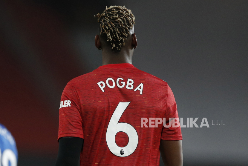  Reaksi Paul Pogba dari Manchester United saat pertandingan sepak bola Liga Utama Inggris antara Manchester United melawan Brighton Hove Albion di Manchester, Inggris, 04 April 2021.