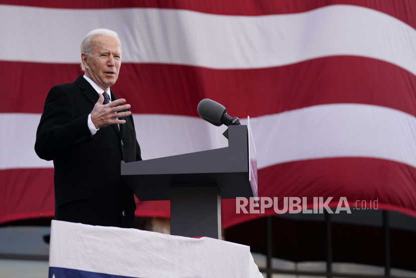 Presiden terpilih Joe Biden berbicara di Pusat Pengawal / Cadangan Nasional Mayor Joseph R. Beau Biden III, Selasa (19/1/2021), di New Castle, Del.
