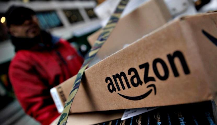 Lagi, Gudang Amazon Milik Orang Terkaya Dunia Dikecam Rawan Corona, 6 Pegawai Meninggal Dunia!. (FOTO: Reuters/Mike Segar)