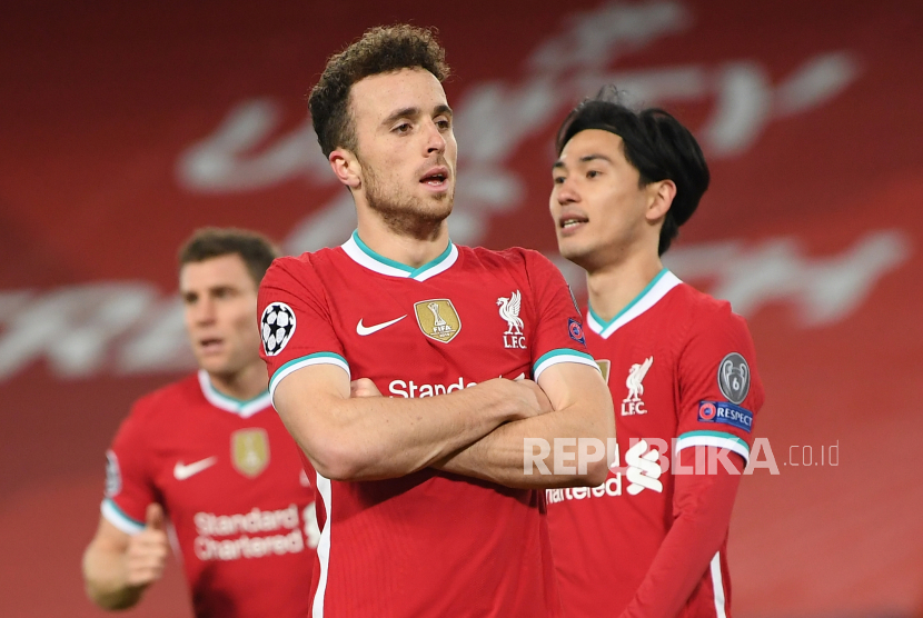 Liverpools Diogo Jota (L) celebrates after scoring a goal during the UEFA Champions League group D match between Liverpool FC and Midtjylland in Liverpool, Britain