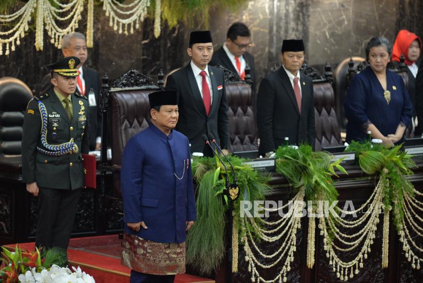 President-elect Prabowo Subianto prepares to deliver the oath/pledge during the plenary session of the Parliament with the agenda of the inauguration of the President and Vice President for the period 2024-2029 at the Nusantara Building, Parliament Complex, Senayan, Jakarta, Sunday (20/10/2024). Prabowo Subianto and Gibran Rakabuming Raka officially serve as president and vice president for the period 2024-2029 replacing president and vice president for the 2019-2024 period Joko Widodo and Maruf Amin.