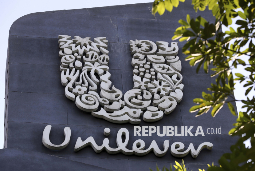 FILE - A Unilever logo is displayed outside the head office of PT Unilever Indonesia Tbk. in Tangerang, Indonesia, Tuesday, Nov. 16, 2021. Unilever, the company that makes Ben & Jerry’s ice cream, Dove soaps and Vaseline, says it