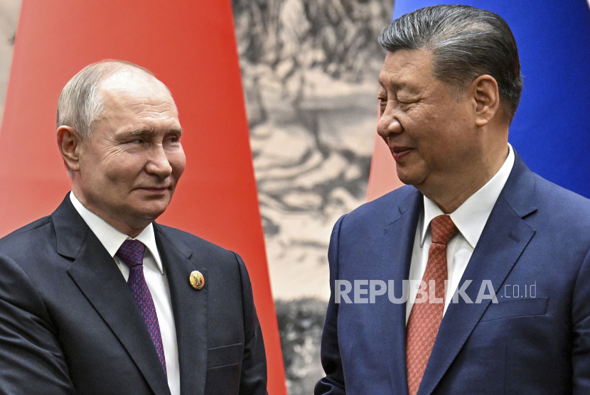 Presiden China Xi Jinping, kanan, dan Presiden Rusia Vladimir Putin.