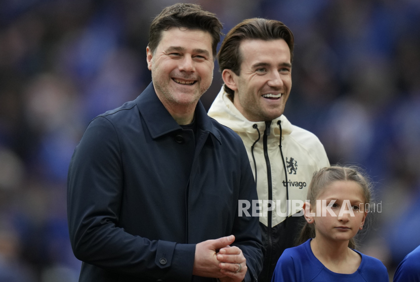 Chelsea head coach Mauricio Pochettino smiles before the English League Cup final soccer match between Chelsea and Liverpool at Wembley Stadium in London, Sunday, Feb. 25, 2024. 