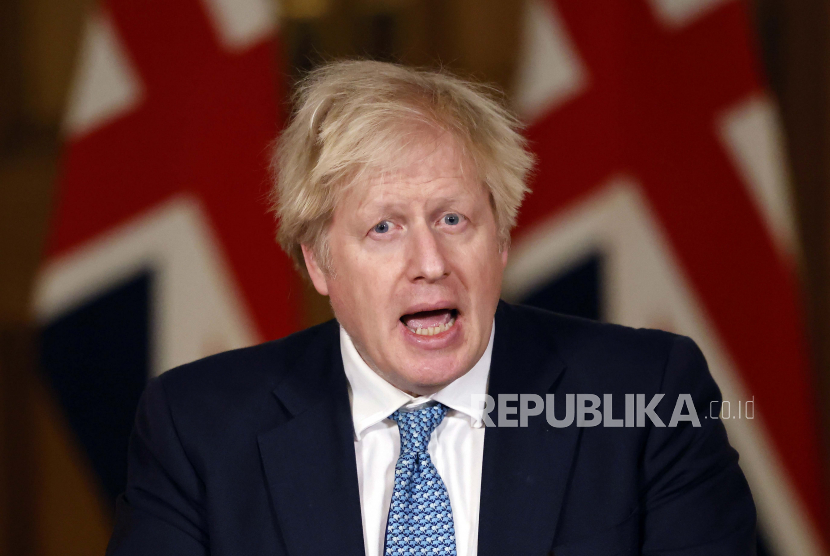  Perdana Menteri Inggris Boris Johnson berbicara selama briefing media tentang virus corona, COVID-19, di Downing Street, London, Kamis 7 Januari 2021.