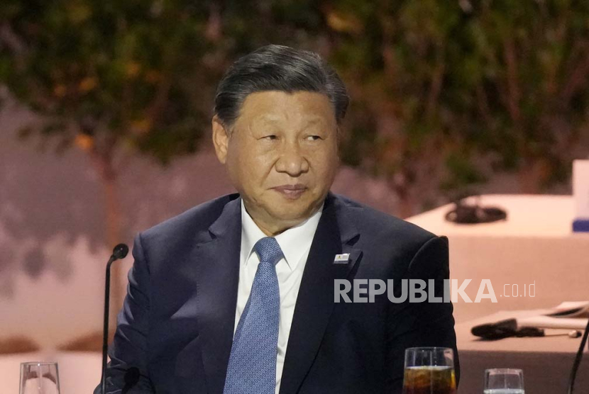 Chinese President Xi Jinping sits next to other world leaders during the Asia-Pacific Economic Cooperation (APEC) conference in San Francisco, Thursday, Nov. 16, 2023. 